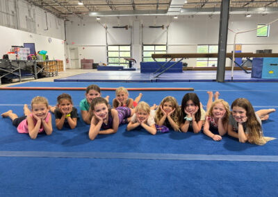 young girl gymnasts smiling